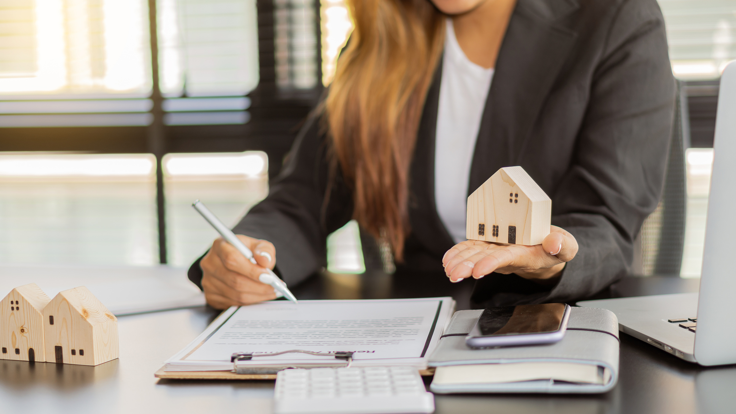 Real estate brokerage contracts for sale and rent with insurance concepts.